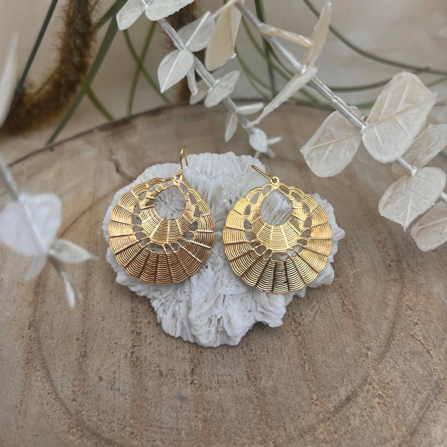 Les boucles d'oreilles Alice