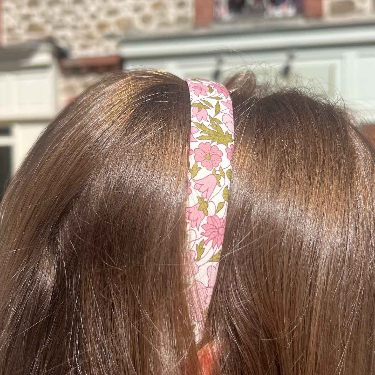 Serre tâte a fleurs rose de la marque Bon Dep